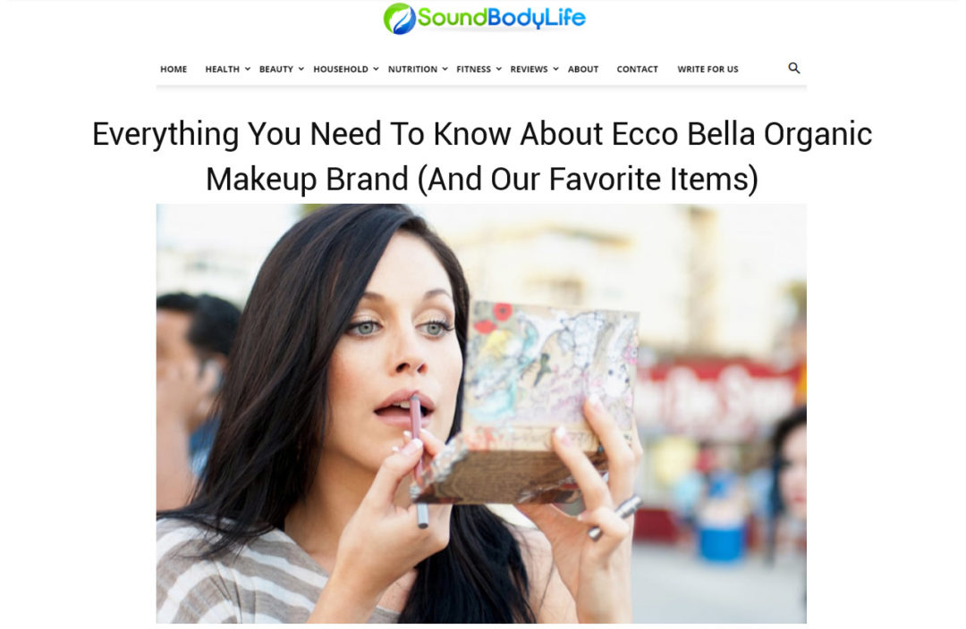 Photo with woman applying lipstick. "Ecco Bella Organic Makeup Brand" - Sound Body Life - Content marketing and editing sample by Elisabeth Parker .